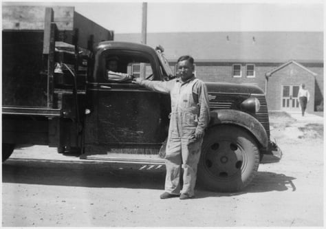 Truck_driver_David_Tiokasin_and_his_truck_-_NARA_-_285888